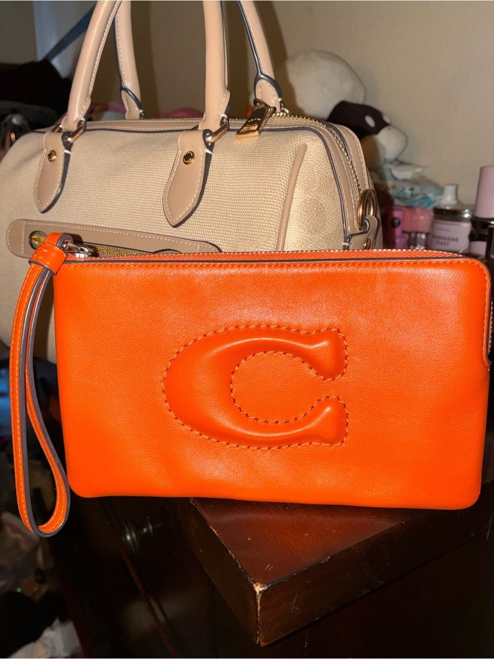 Coach Orange Leather Wristlet with Embossed C Patch